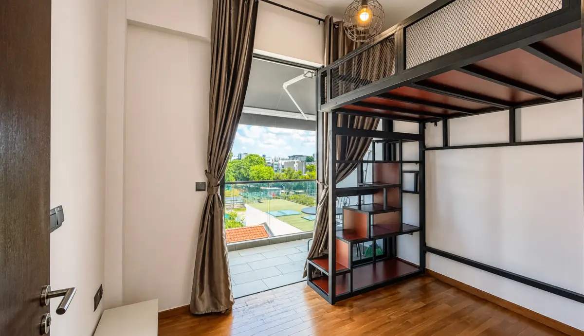 Loft-style bedroom with a black metal bunk bed, built-in shelves, and wood flooring, opening to a balcony with a city view.