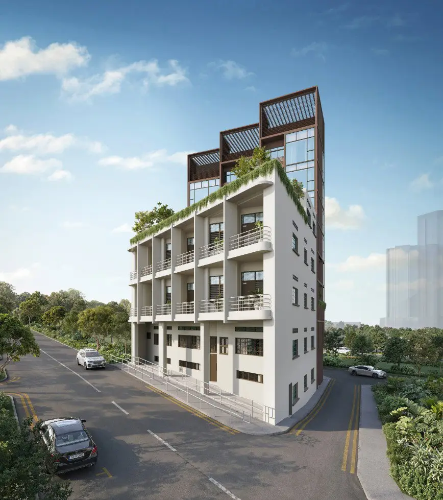 Contemporary four-story residential building with balconies and a rooftop garden beside a tree-lined street.